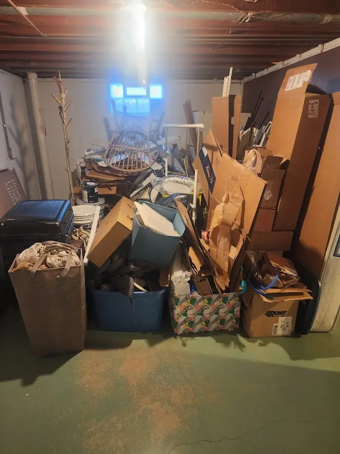 Roll-off dumpster container at job site for 8 Yard Dumpster Rental in Lula